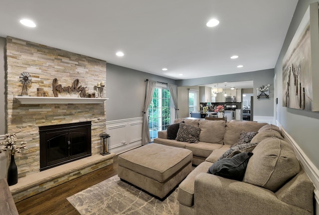 562 Revere Ave, Westmont, IL 60559 - living area featuring wood finished floors, recessed lighting, and a stone fireplace