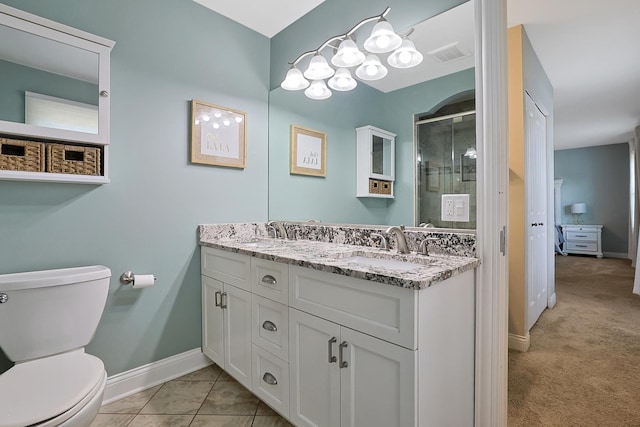 562 Revere Ave, Westmont, IL 60559 - bathroom featuring a stall shower and double vanity