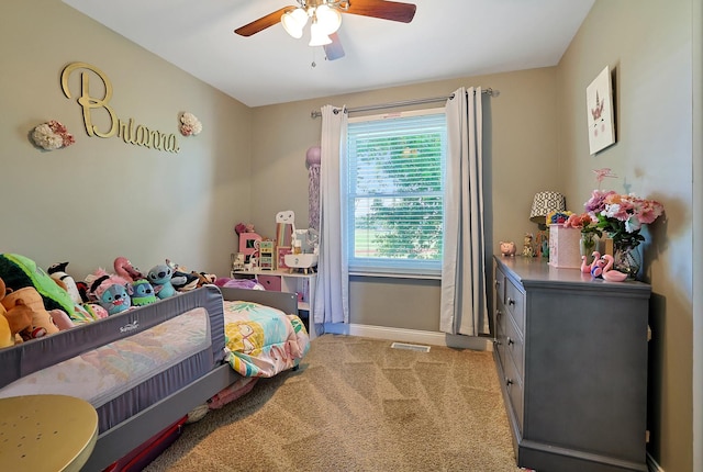 562 Revere Ave, Westmont, IL 60559 - carpeted bedroom featuring baseboards and a ceiling fan