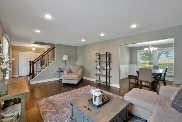 562 Revere Ave, Westmont, IL 60559 - living room with a chandelier, stairs, dark wood-style floors, recessed lighting, and wainscoting