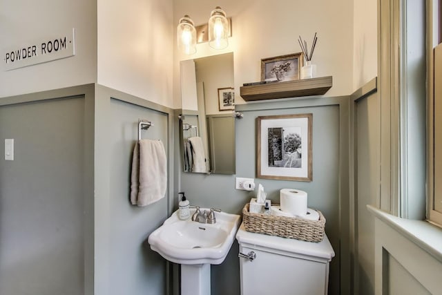9906 S Saint Louis Ave, Evergreen Park, IL 60805 - half bathroom featuring toilet and a sink