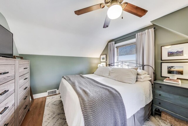 9906 S Saint Louis Ave, Evergreen Park, IL 60805 - bedroom featuring lofted ceiling, wood finished floors, ceiling fan, and baseboards