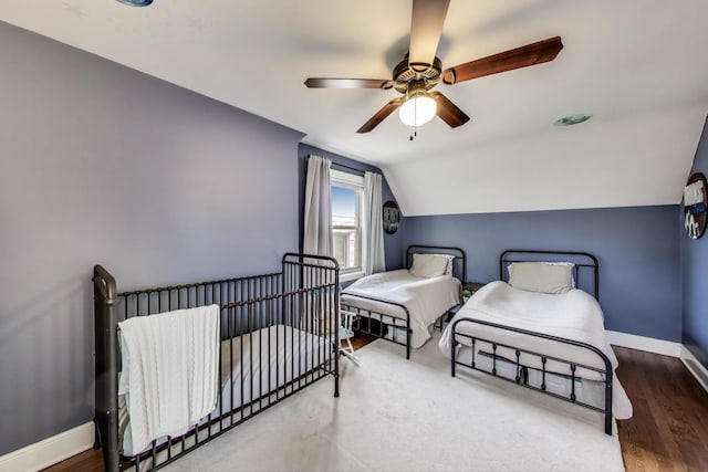 9906 S Saint Louis Ave, Evergreen Park, IL 60805 - bedroom with baseboards, lofted ceiling, wood finished floors, and a ceiling fan