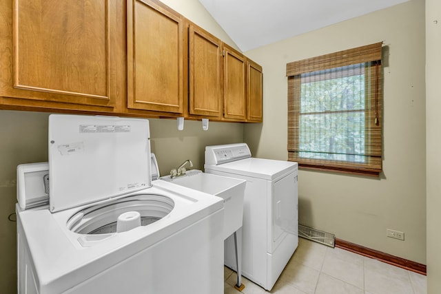 24721 S Walnut St, Crete, IL 60417 - laundry area with washer and clothes dryer, light tile patterned floors, cabinet space, and baseboards