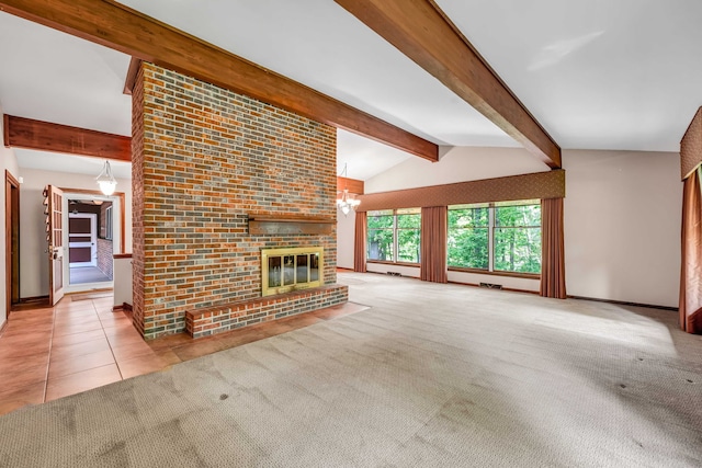 24721 S Walnut St, Crete, IL 60417 - unfurnished living room featuring a fireplace, carpet floors, baseboards, a chandelier, and tile patterned flooring
