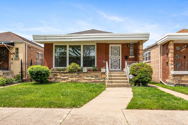 8952 S E End Ave, Chicago, IL 60617 - bungalow-style house with covered porch and brick siding