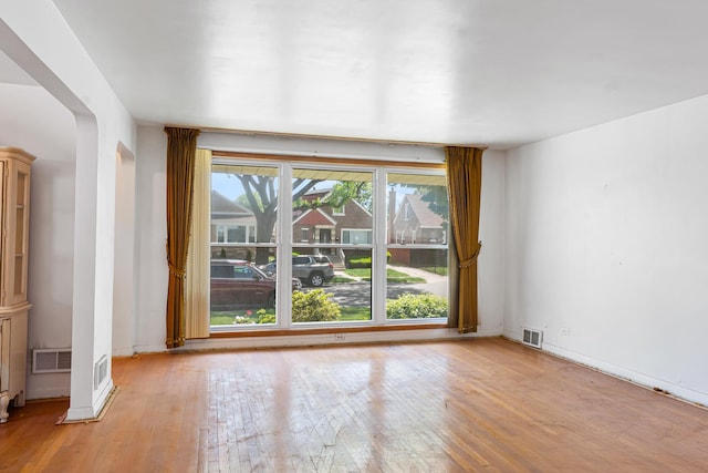 8952 S E End Ave, Chicago, IL 60617 - unfurnished room with wood finished floors and baseboards