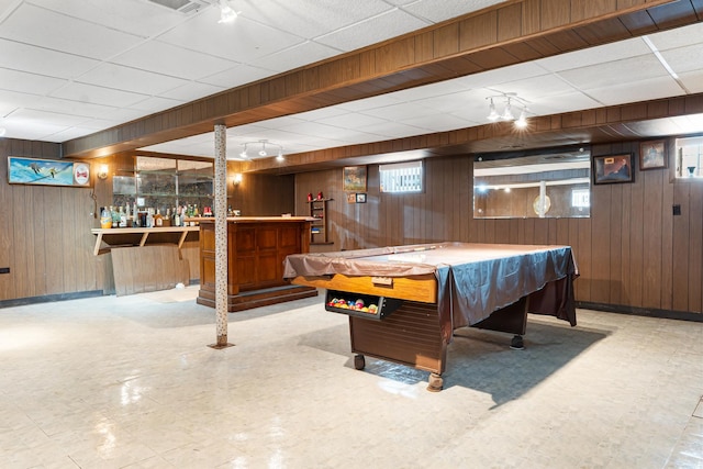 8952 S E End Ave, Chicago, IL 60617 - rec room with wooden walls, a dry bar, tile patterned floors, a drop ceiling, and baseboards