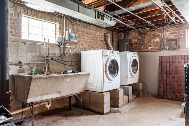 8952 S E End Ave, Chicago, IL 60617 - laundry room featuring separate washer and dryer, electric panel, and brick wall