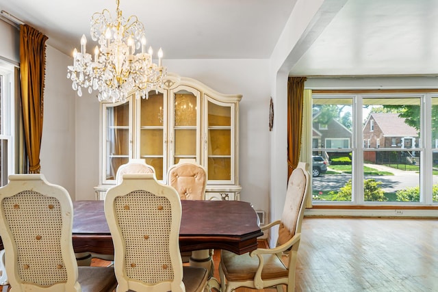 8952 S E End Ave, Chicago, IL 60617 - dining space with a chandelier and wood finished floors