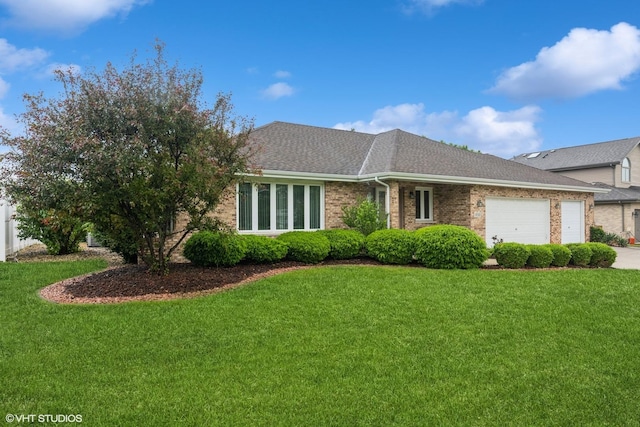 19510 Blyth Way, Mokena, IL 60448 - view of front facade featuring an attached garage, brick siding, and a front lawn