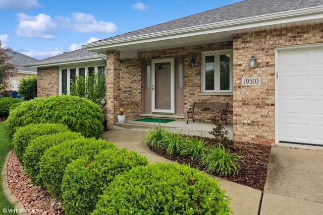 19510 Blyth Way, Mokena, IL 60448 - view of exterior entry with brick siding, covered porch, and a shingled roof
