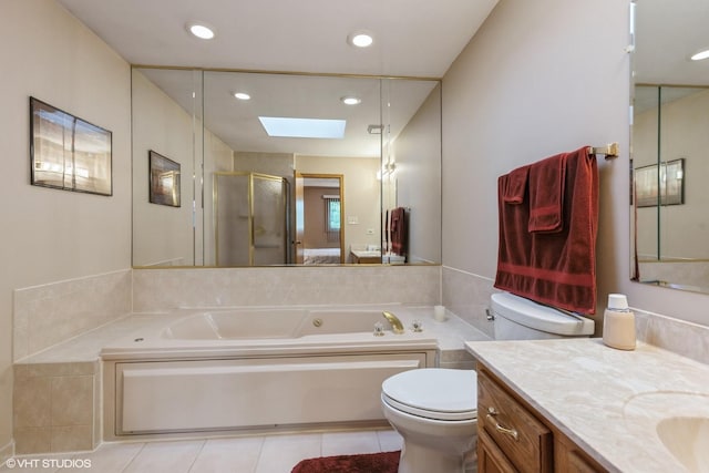 19510 Blyth Way, Mokena, IL 60448 - bathroom featuring a skylight, a whirlpool tub, toilet, tile patterned flooring, and vanity