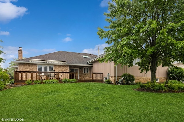19510 Blyth Way, Mokena, IL 60448 - back of house featuring a chimney, a yard, brick siding, and a deck