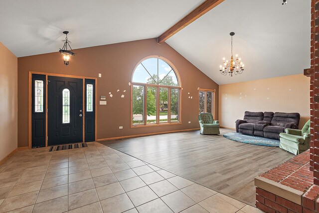 8542 Monaghan Dr, Tinley Park, IL 60487 - foyer entrance with light tile patterned flooring, a chandelier, beamed ceiling, high vaulted ceiling, and baseboards