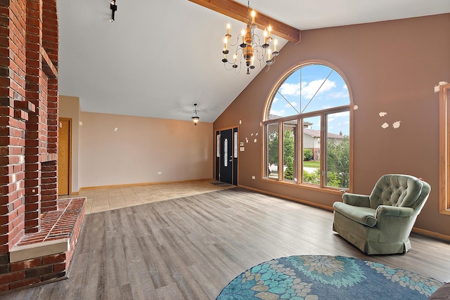 8542 Monaghan Dr, Tinley Park, IL 60487 - unfurnished living room featuring beam ceiling, high vaulted ceiling, a chandelier, wood finished floors, and baseboards