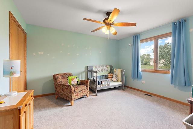 8542 Monaghan Dr, Tinley Park, IL 60487 - bedroom with baseboards, light carpet, and ceiling fan