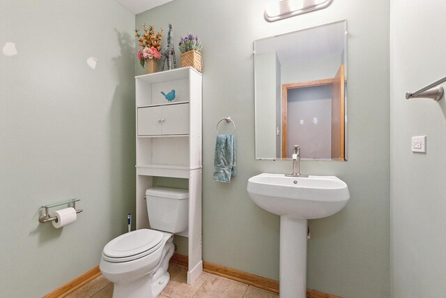 8542 Monaghan Dr, Tinley Park, IL 60487 - half bathroom with toilet and baseboards