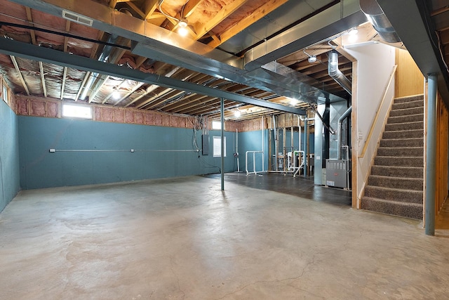 8542 Monaghan Dr, Tinley Park, IL 60487 - basement with stairway, heating unit, and electric panel