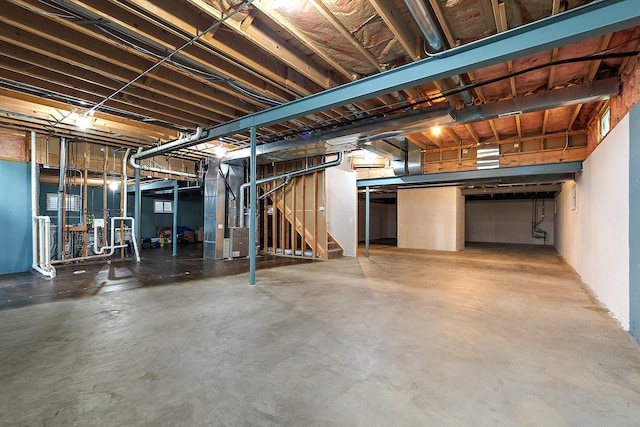 8542 Monaghan Dr, Tinley Park, IL 60487 - unfinished basement featuring heating unit and stairway