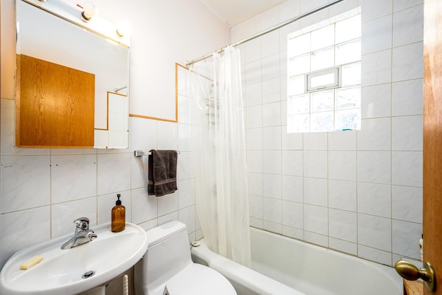 2002 W Huron St, Chicago, IL 60612 - bathroom featuring shower / bath combination with curtain and tile walls