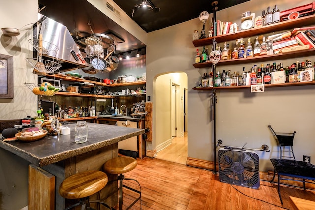 2002 W Huron St, Chicago, IL 60612 - bar with light wood-style floors and arched walkways