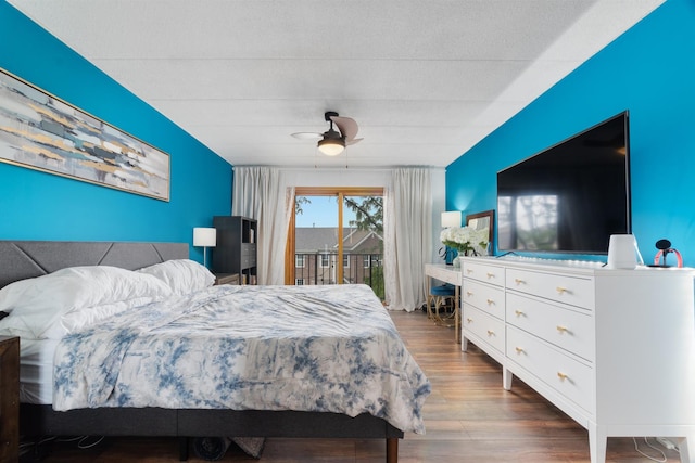 825 Center St Unit 302, Des Plaines, IL 60016 - bedroom with access to exterior, wood finished floors, and ceiling fan