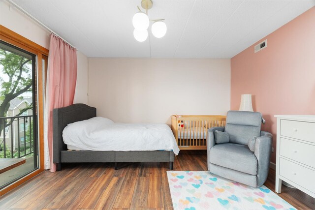 825 Center St Unit 302, Des Plaines, IL 60016 - bedroom featuring wood finished floors and access to outside