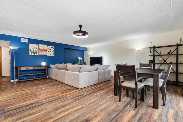 825 Center St Unit 302, Des Plaines, IL 60016 - dining area featuring wood finished floors and a textured ceiling