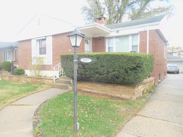 2517 S 4th Ave, North Riverside, IL 60546 - view of front of home featuring brick siding and a chimney
