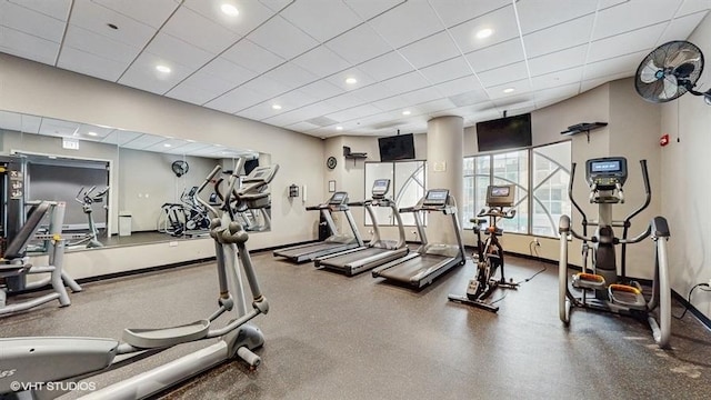 630 N State St Unit 2403, Chicago, IL 60654 - exercise room with a paneled ceiling and baseboards