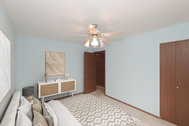 1611 W Partridge Ct Unit 8, Arlington Heights, IL 60004 - bedroom featuring light colored carpet, ceiling fan, a closet, and baseboards