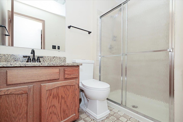 1611 W Partridge Ct Unit 8, Arlington Heights, IL 60004 - full bathroom with vanity, a stall shower, tile patterned floors, and toilet