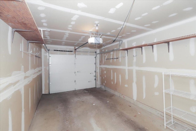 1611 W Partridge Ct Unit 8, Arlington Heights, IL 60004 - garage featuring a garage door opener