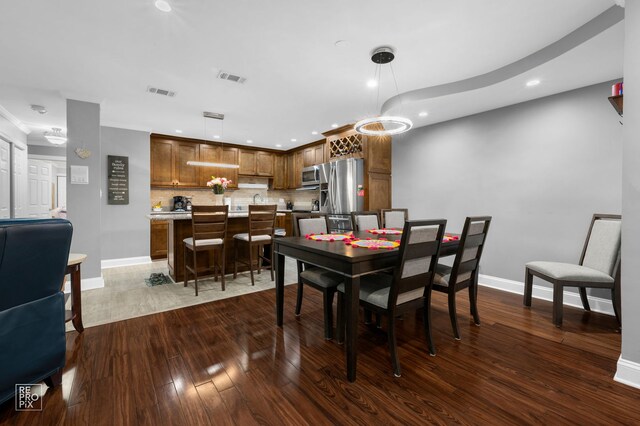 7525 Nantucket Dr Unit 109, Darien, IL 60561 - dining room with baseboards, recessed lighting, and dark wood-style floors