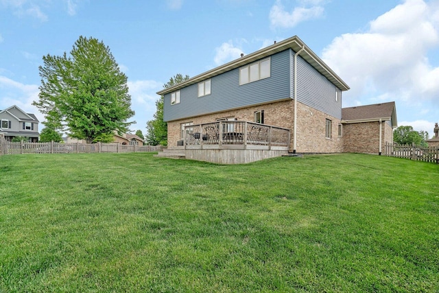 601 High Grove Dr, Minooka, IL 60447 - rear view of property with a deck and brick siding