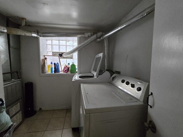 5747 S Laflin St, Chicago, IL 60636 - laundry area with washer and dryer and light tile patterned flooring