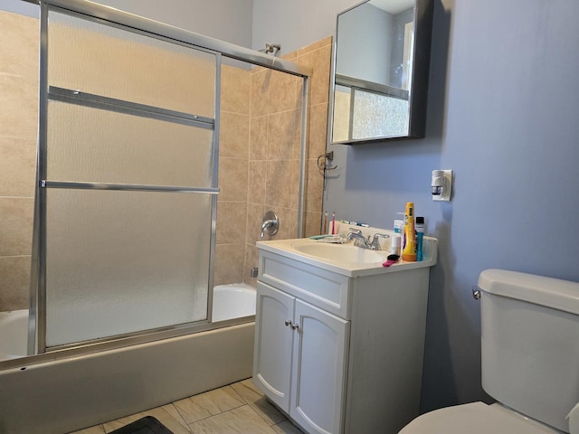 5747 S Laflin St, Chicago, IL 60636 - full bath featuring vanity, combined bath / shower with glass door, and toilet