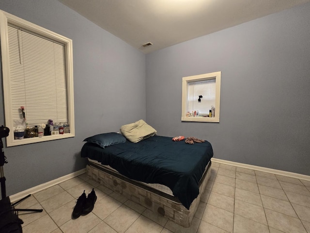 5747 S Laflin St, Chicago, IL 60636 - bedroom with tile patterned floors and baseboards