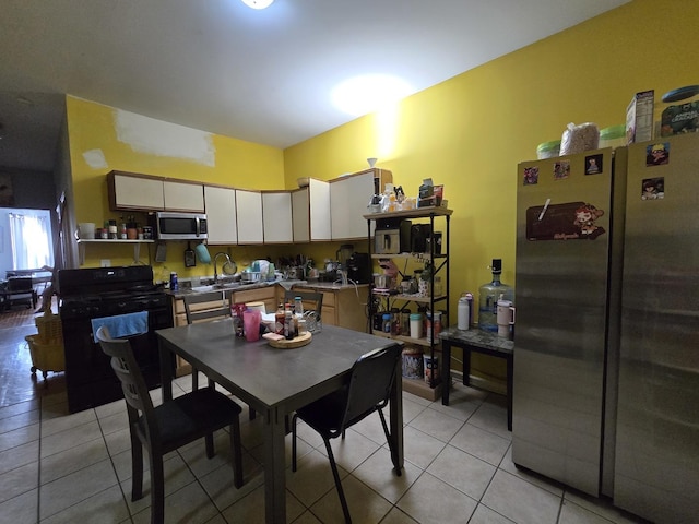 5747 S Laflin St, Chicago, IL 60636 - dining area with light tile patterned floors