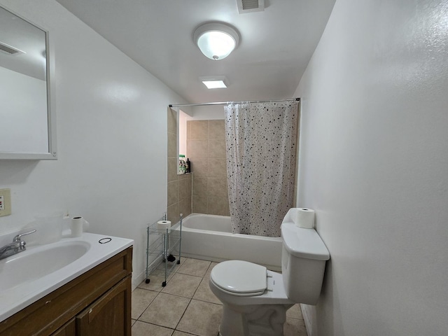5747 S Laflin St, Chicago, IL 60636 - full bath with tile patterned floors, toilet, vanity, shower / bathtub combination with curtain, and baseboards