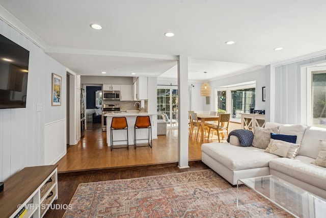1161 Vernon Dr, Glenview, IL 60025 - living area featuring dark wood-style floors and recessed lighting