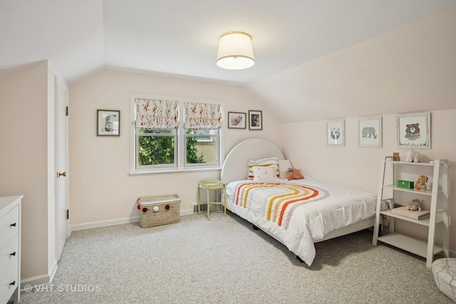 1161 Vernon Dr, Glenview, IL 60025 - carpeted bedroom with vaulted ceiling and baseboards