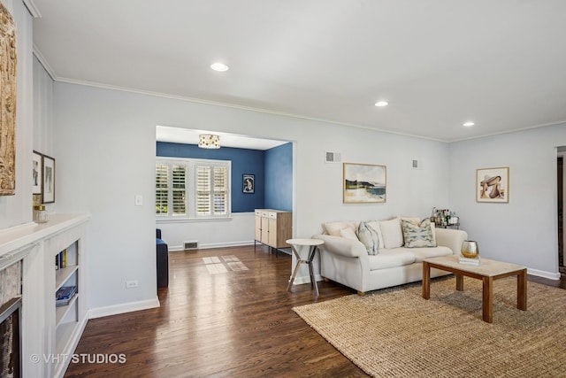 1161 Vernon Dr, Glenview, IL 60025 - living area with dark wood finished floors, ornamental molding, baseboards, and recessed lighting