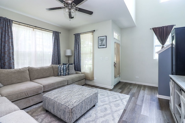 3601 Daisy Ln, Elgin, IL 60124 - living room featuring dark wood finished floors, baseboards, and a ceiling fan