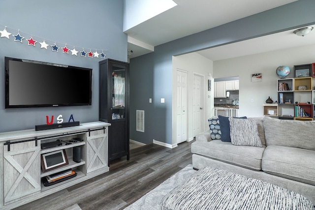 3601 Daisy Ln, Elgin, IL 60124 - living room featuring dark wood finished floors and baseboards