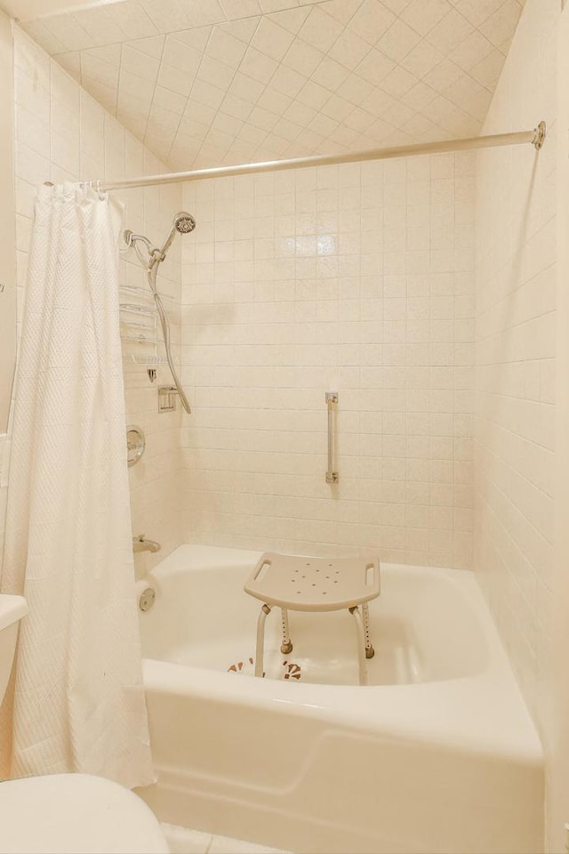 2700 E Bel Aire Dr Unit 202, Arlington Heights, IL 60004 - bathroom featuring shower / bathtub combination with curtain and toilet