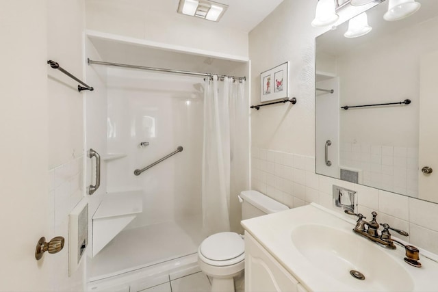 2700 E Bel Aire Dr Unit 202, Arlington Heights, IL 60004 - bathroom with a stall shower, toilet, vanity, and tile walls