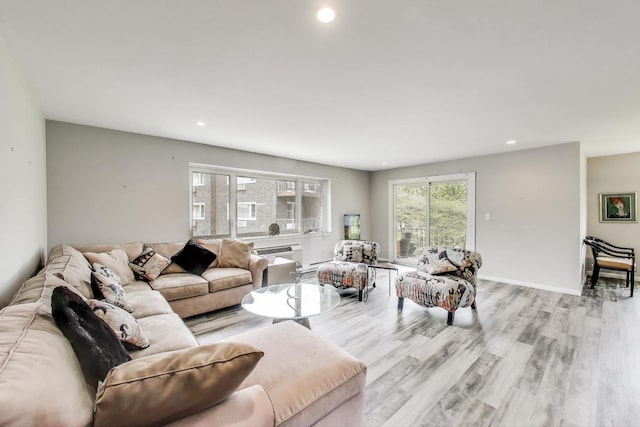 2700 E Bel Aire Dr Unit 202, Arlington Heights, IL 60004 - living room with light wood finished floors, recessed lighting, and an AC wall unit