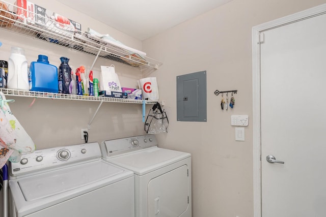 310 Cascade Ln Unit 310, Oswego, IL 60543 - washroom featuring electric panel and separate washer and dryer